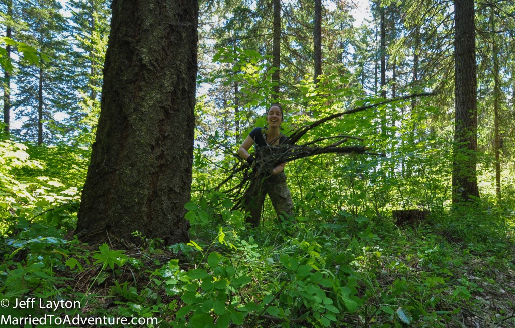 Amanda works to clear one of the dozens of burn piles scattered around the property