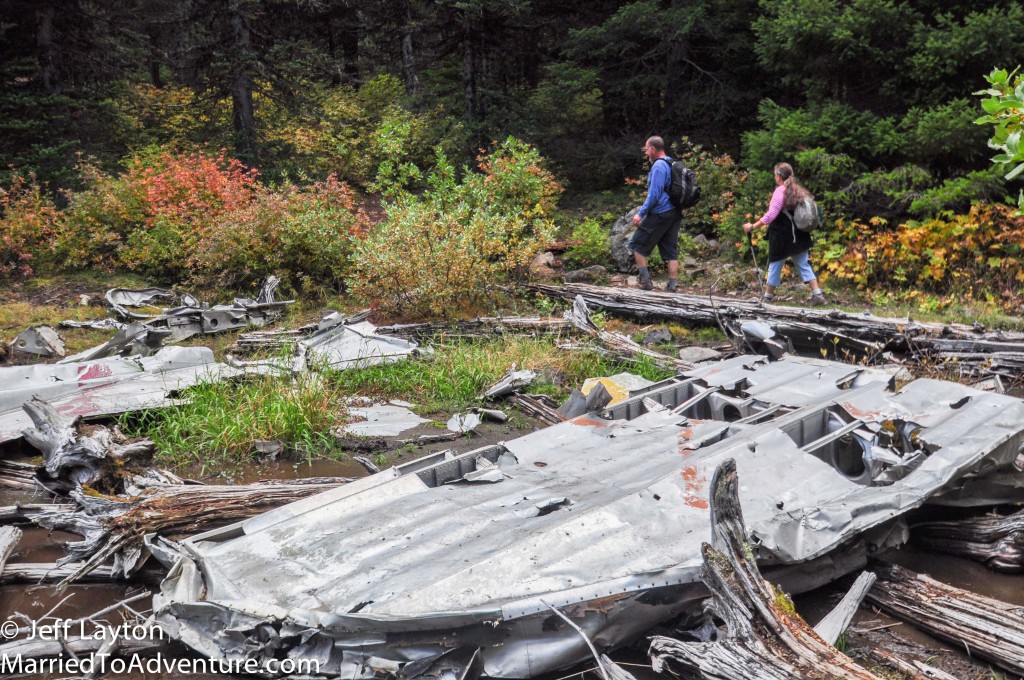 Hikers pass the remains of flight #XXX which crashed in XX, year